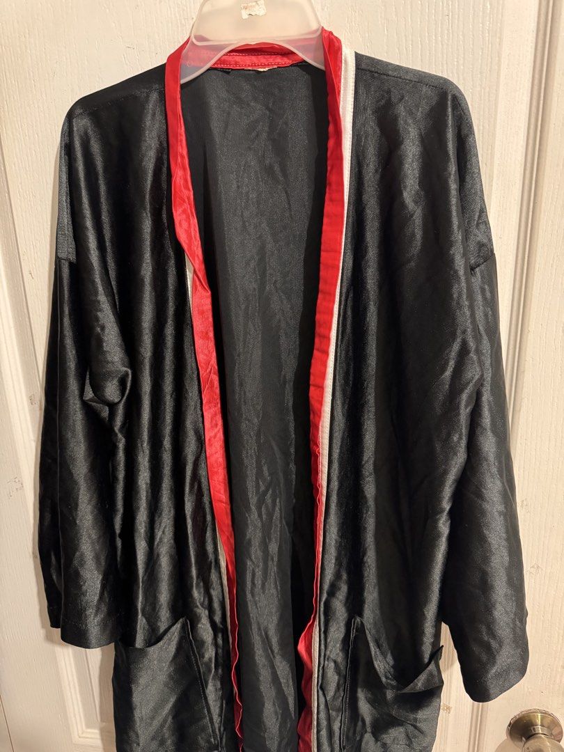 Boxing robe/Black satin/Halloween Accessory (Category: Coats, Jackets and Outerwear) located in San Juan City. Submitted by matchlessgetup.ph (Listing ID 1471005156, Image 2). Description: Perfect as an edgy loungewear piece, a creative costume accessory (ideal for boxing-inspired looks or Halloween styling), or a statement layering item. Crafted from a smooth, lightweight satin-finish fabric, this piece offers a sleek silhouette with striking co