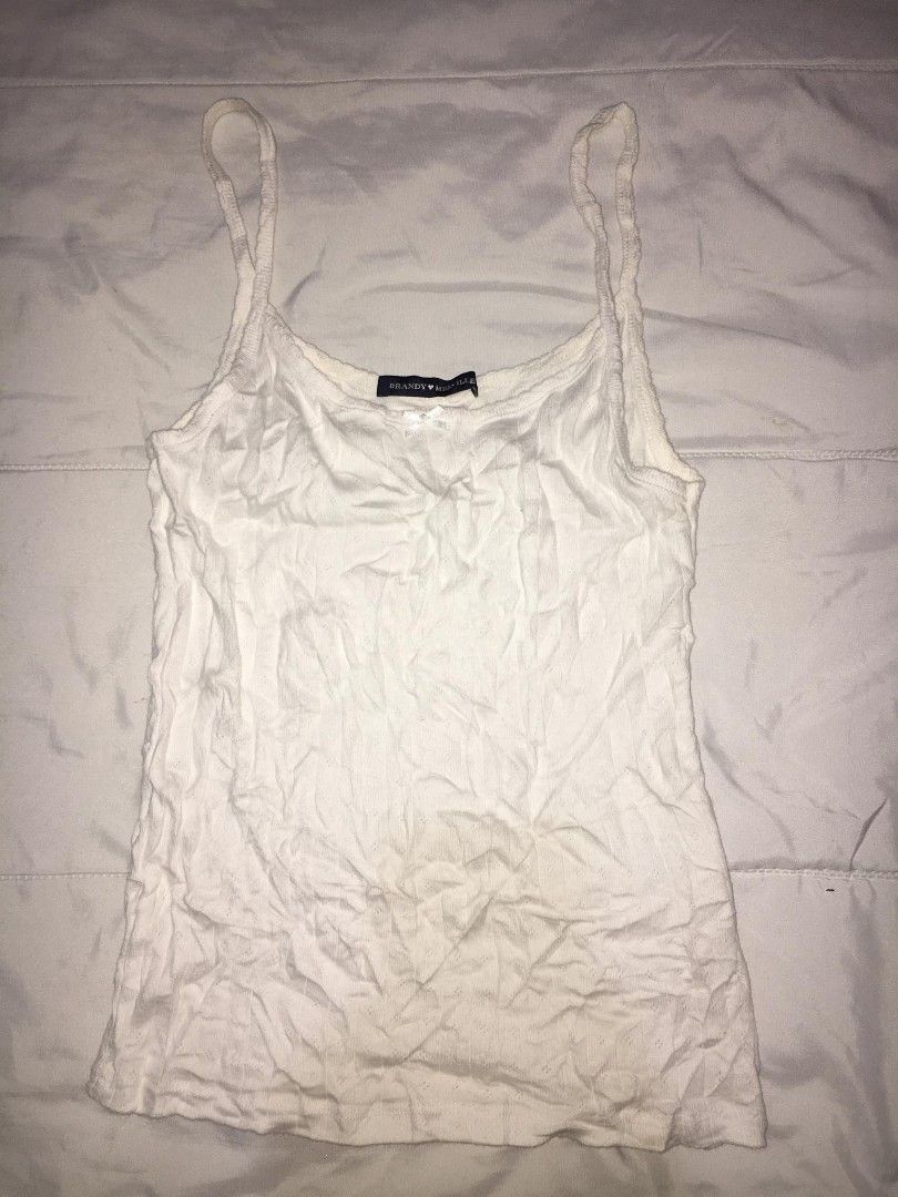 Brandy Melville spaghetti-strap tank top (Category: Longsleeves) located in Quezon City. Submitted by thriftyzx (Listing ID 1471079069, Image 1). Description: Brandy Melville spaghetti-strap tank top Excellent Condition No issue 699 Freeshipping Location: QC.