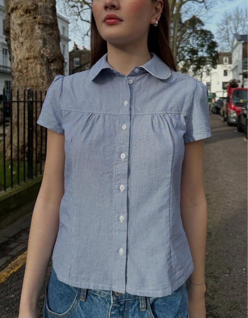 Brandy Melville Teagan Top - Short Sleeve Button Down (Category: Blouses) located in Manila. Submitted by jenniebee (Listing ID 1471052907, Image 1). Description: - Blue and White Brandy Melville Teagan Top - RFS: not my style anymore .