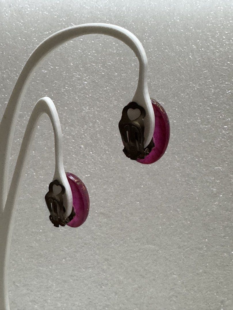 Breath Earrings (Category: Earrings) located in Angeles City. Submitted by zyeplustradings (Listing ID 1470960091, Image 2). Description: They feature oval, semi-translucent magenta-pink resin or art glass beads infused with fine golden, thread-like abstract striations. German markings.