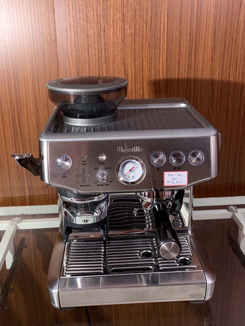 Breville Barista Express Espresso Machine (Category: Coffee Machines & Makers) located in Pulilan. Submitted by sebbii (Listing ID 1470959218, Image 1). Description: Breville espresso machine in stainless steel finish. Built-in grinder on top with bean hopper. Pressure gauge right on the front panel. Portafilter locks into the group head smoothly. Steam wand attached on the side for frothing milk. Drip tray sits securely underneath. Power button,