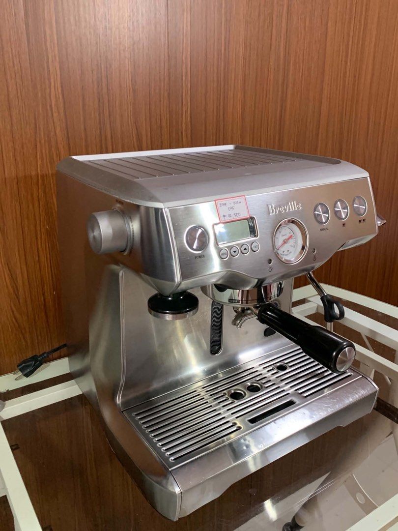 Breville Dual Boiler Espresso Machine (Category: Coffee Machines & Makers) located in Pulilan. Submitted by sebbii (Listing ID 1470958975, Image 2). Description: - Brand: Breville Dual Boiler Espresso Machine - Material: Premium stainless steel housing with clean drip tray - Features: Professional built-in pressure gauge, powerful steam wand, and included portafilter - Plug Type: Standard plug (ready to use in PH outlets) - Condition: Well-mainta