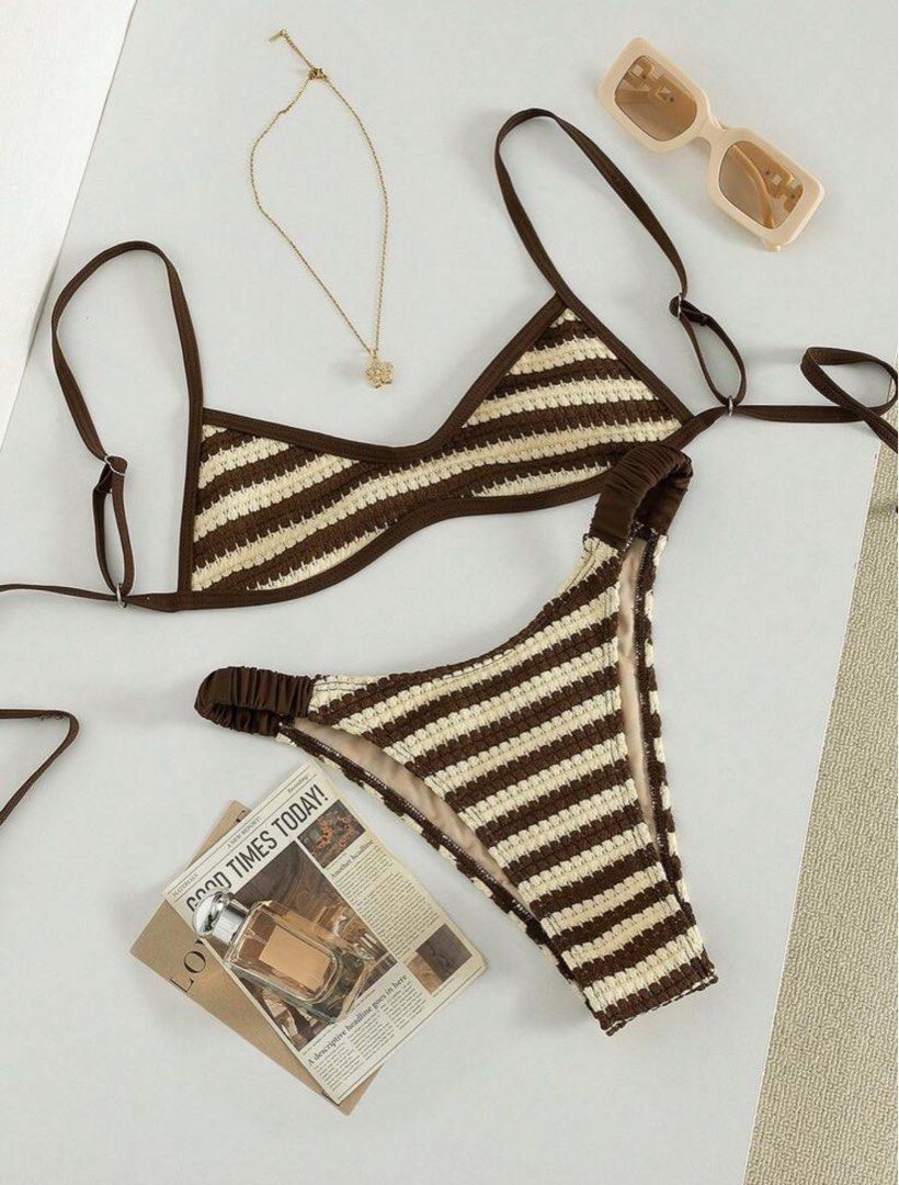 Brown and White Striped Bikini Set (Category: Bikinis & Swimsuits) located in San Juan City. Submitted by colleendom (Listing ID 1471036640, Image 3). Description: - Brand: New with tags attached - Size: Small (S) - Style: Brown and cream striped crochet bikini set - Top: Triangle top with adjustable straps - Bottoms: Matching classic bottoms - Condition: Unworn, brand new - Perfect for: Beach trips, pool days, and vacations.