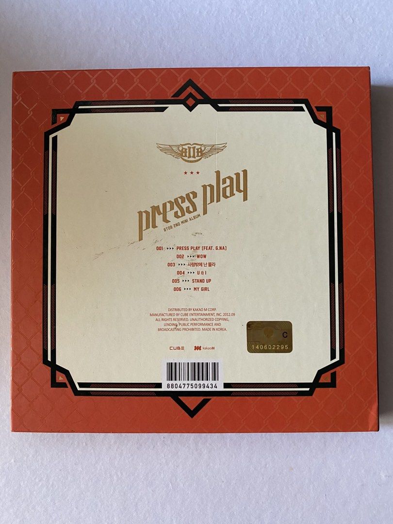BTOB Press Play 2nd Mini Album (Category: CDs & DVDs) located in Manila. Submitted by declutteringpj24 (Listing ID 1471064680, Image 2). Description: - Artist & Album: BTOB 2nd Mini Album - Press Play - Release Year: 2012 by Cube Entertainment - Condition: Official K-pop release complete with barcode and sticker on the back - Tracklist includes: Press Play, Wow, and 4 other hits - Design: Vibrant orange cover with elegant gold typography - Perfec