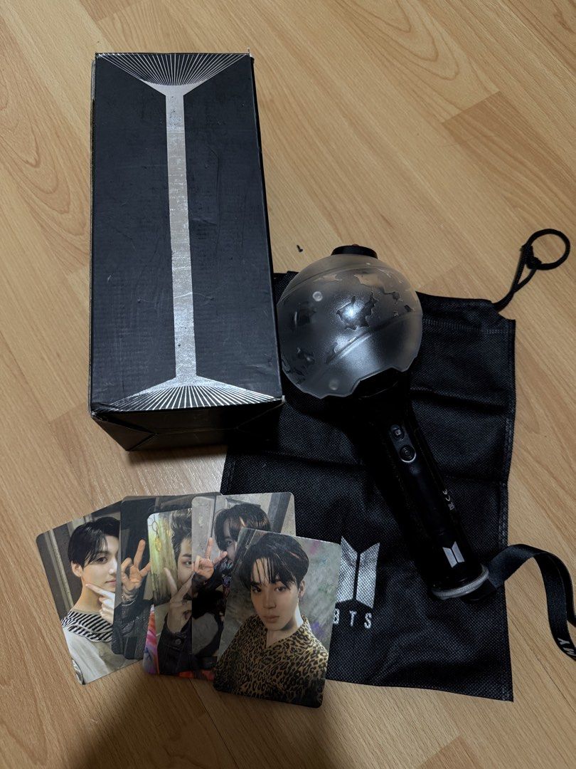 BTS Army Bomb Ver. 3 (Category: K-Wave Merchandise) located in Manila. Submitted by miksii_. (Listing ID 1471038127, Image 2). Description: - Official BTS Special Edition Army Bomb lightstick - Black handle with white globe (glows in the dark) - Tested and fully working - Includes original outer box - Includes black dust bag with silver BTS logo - Includes strap marked ARMY - Ready for concerts or display.