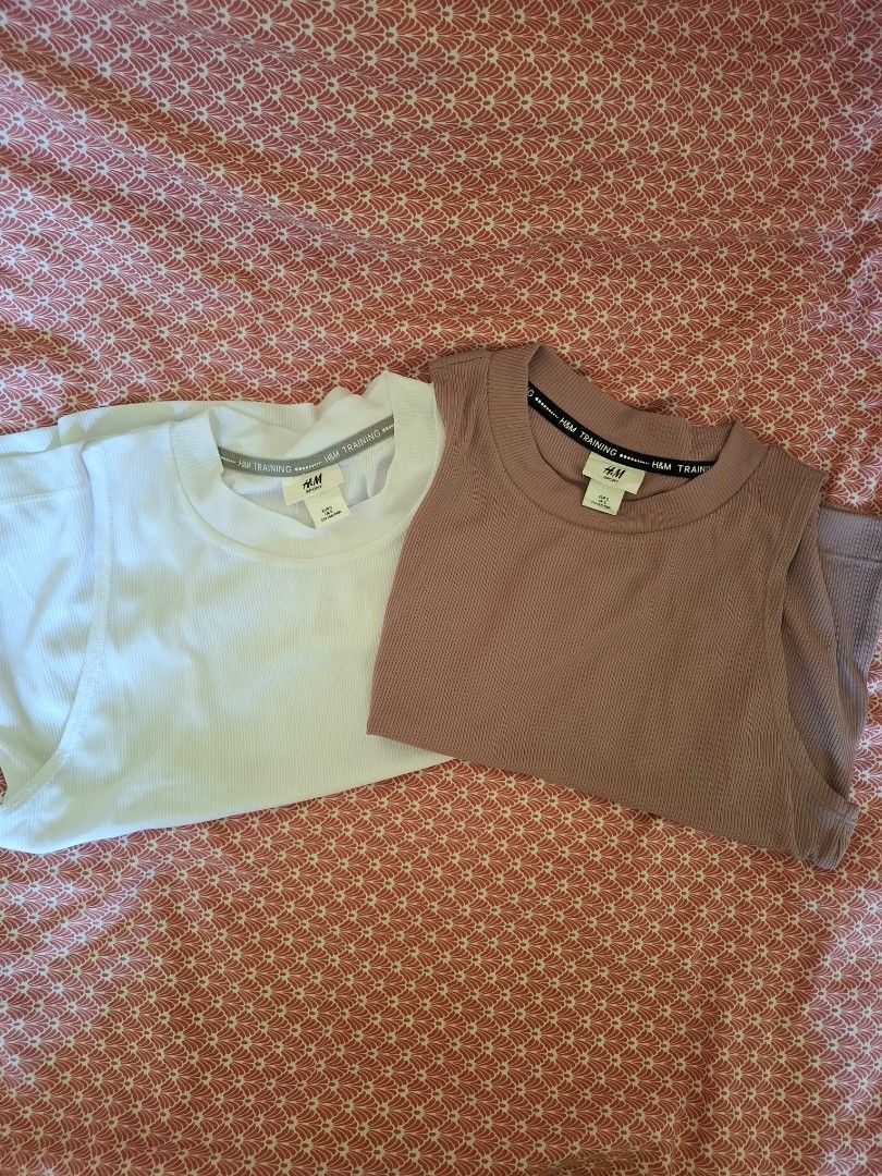 [BUNDLE] H&M Active Tanktop (Category: Activewear) located in Caloocan City. Submitted by inmediasres (Listing ID 1470958953, Image 1). Description: H&M white and mauve activewear tank tops as SET. Colors may differ in real life. Size: Small Flaws: none Delivery: Lalamove, Gogoexpress, Flash Express. Shouldered by buyer..