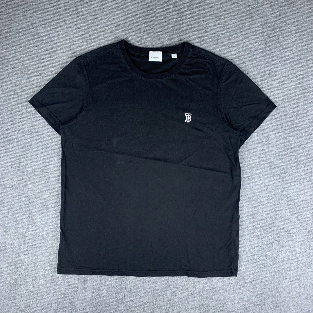 Burberry Black TB Monogram T-Shirt (Category: Tshirts & Polo Shirts ) located in Baguio. Submitted by vintage_lurker (Listing ID 1471087365, Image 1). Description: Size on tag: XL fits Medium Width: 21” Length: 27” Issue/s: none Mine: 790 + Shipping fee 📍Payment first policy. no COD or COP 📍All items Washed and Sanitized 🧼 Shoot your offer. I’m all ears‼️ OTHER DETAILS: - Brand: Burberry - Color: Black - Size: XL - Design: Classic crewneck wit