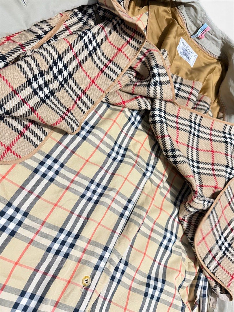 BURBERRY DOUBLE BREASTED TRENCH COAT (Category: Coats, Jackets and Outerwear) located in Dasmarinas. Submitted by nvrgobrkagain. (Listing ID 1471050797, Image 2). Description: -Vintage burberry's beige trench coat with 2 layers of full plaid design on the inner part WIDTH : 21 IN LENGTH : 39 IN.