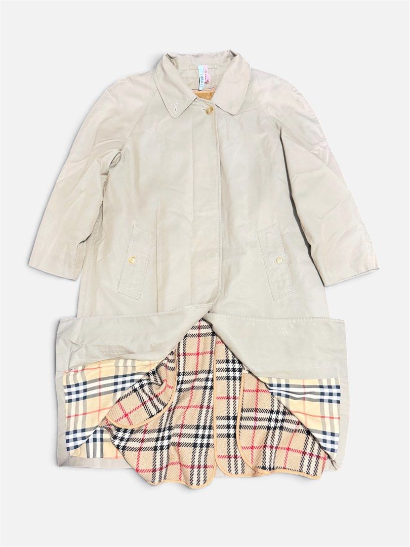 BURBERRY DOUBLE BREASTED TRENCH COAT (Category: Coats, Jackets and Outerwear) located in Dasmarinas. Submitted by nvrgobrkagain. (Listing ID 1471050797, Image 1). Description: -Vintage burberry's beige trench coat with 2 layers of full plaid design on the inner part WIDTH : 21 IN LENGTH : 39 IN.