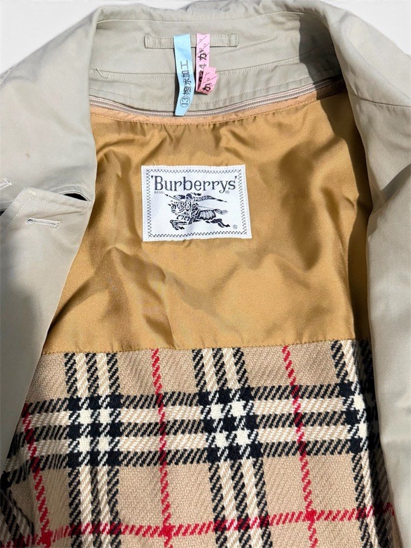 BURBERRY DOUBLE BREASTED TRENCH COAT (Category: Coats, Jackets and Outerwear) located in Dasmarinas. Submitted by nvrgobrkagain. (Listing ID 1471050797, Image 3). Description: -Vintage burberry's beige trench coat with 2 layers of full plaid design on the inner part WIDTH : 21 IN LENGTH : 39 IN.