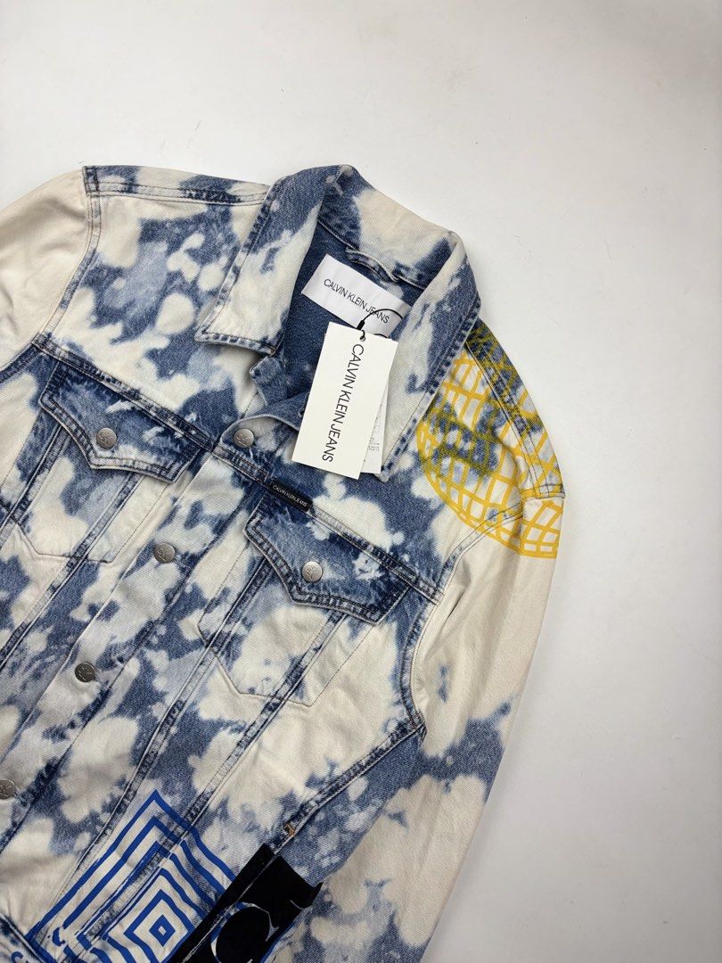 Calvin Klein - Raf Simons - Bleached Denim Jacket (Category: Coats, Jackets and Outerwear) located in Makati City. Submitted by ragrepository (Listing ID 1471116681, Image 2). Description: Calvin Klein - Raf Simons - Bleached Denim Jacket Tagged as Large Length- 27” Pit to pit- 22.5” Sleeves- 25.5” Shoulder-19” Condition- NWT Flaw-None .