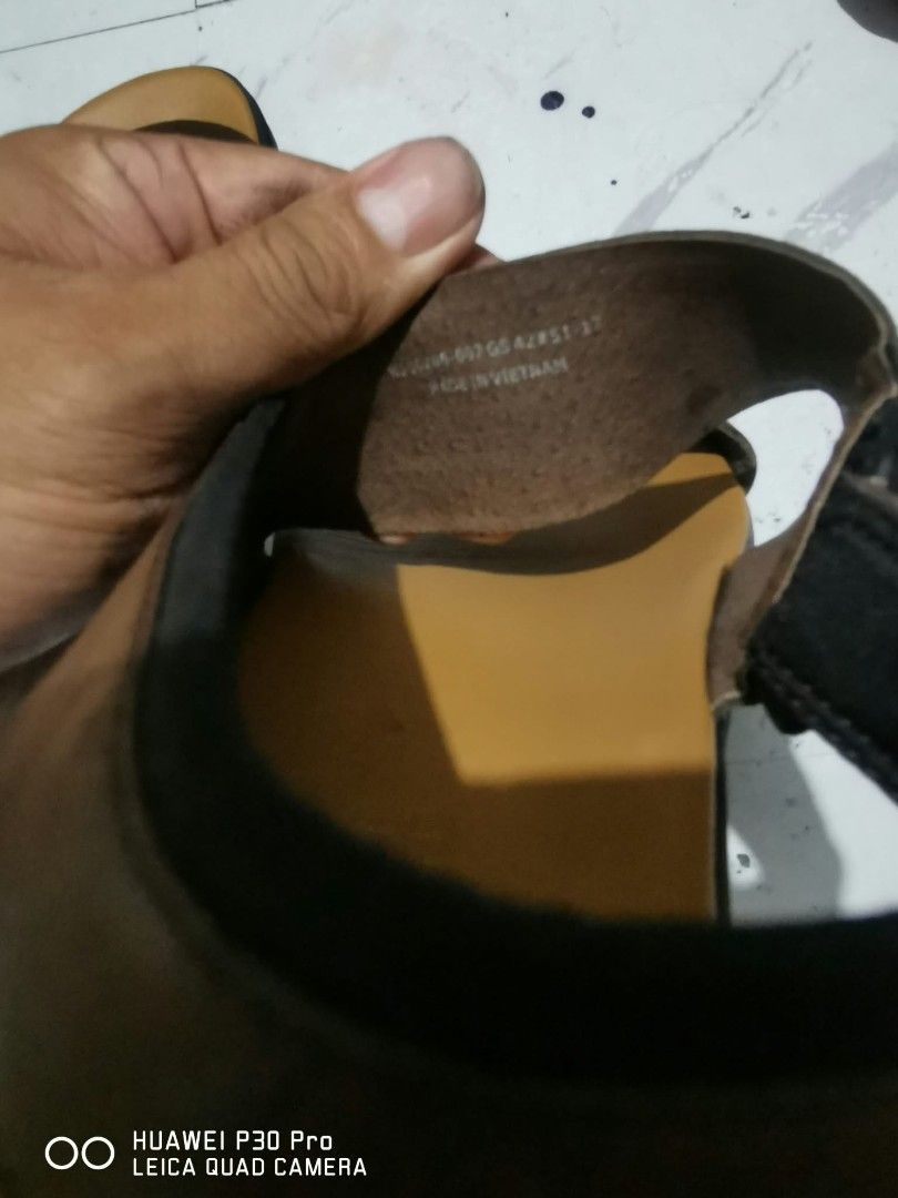 Camper Men's Brown Leather Sandals Size 42 (Category: Slippers & Slides) located in Makati City. Submitted by relianzmae57131 (Listing ID 1471050949, Image 3). Description: - Brand: Camper - Color: Brown - Size: 42 (stamped on sole) - Material: Leather with clean tan footbed - Design: Double strap with ankle strap closure - Sole: Wave tread pattern with Camper logo - Origin: Made in Vietnam - Condition: Worn with minor signs of use on the inner s