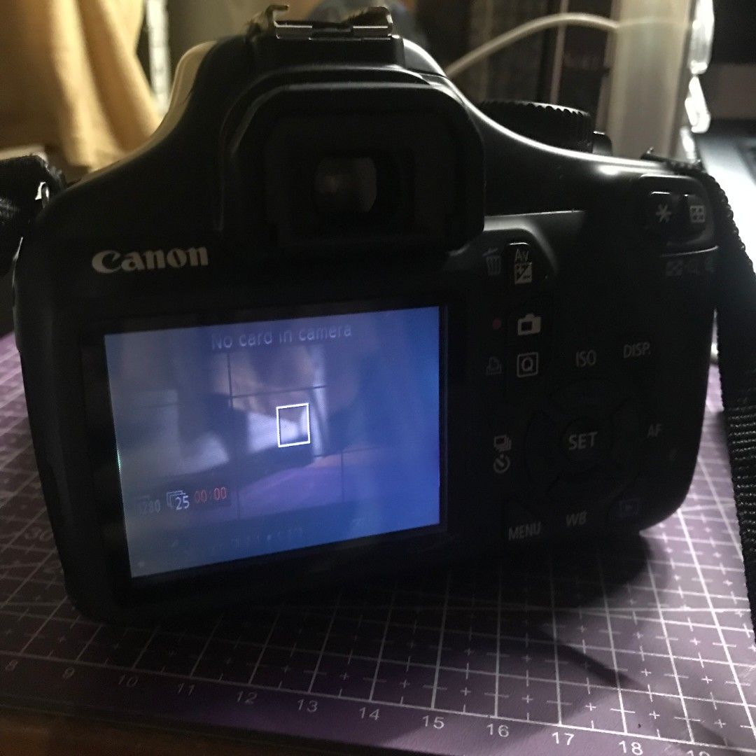 Canon EOS 1100D DSLR Camera with Lens and Bag (Category: Cameras) located in Manila. Submitted by kazoolove (Listing ID 1471030623, Image 3). Description: - Canon EOS 1100D DSLR Camera - issue is vignette on lcd screen - 18-55mm IS Lens included - Tamrac shoulder bag and Canon battery charger included - Powers on perfectly with a clear LCD screen - Memory card slot empty (ready for your own SD card) - Ideal and affordable setup for photography be