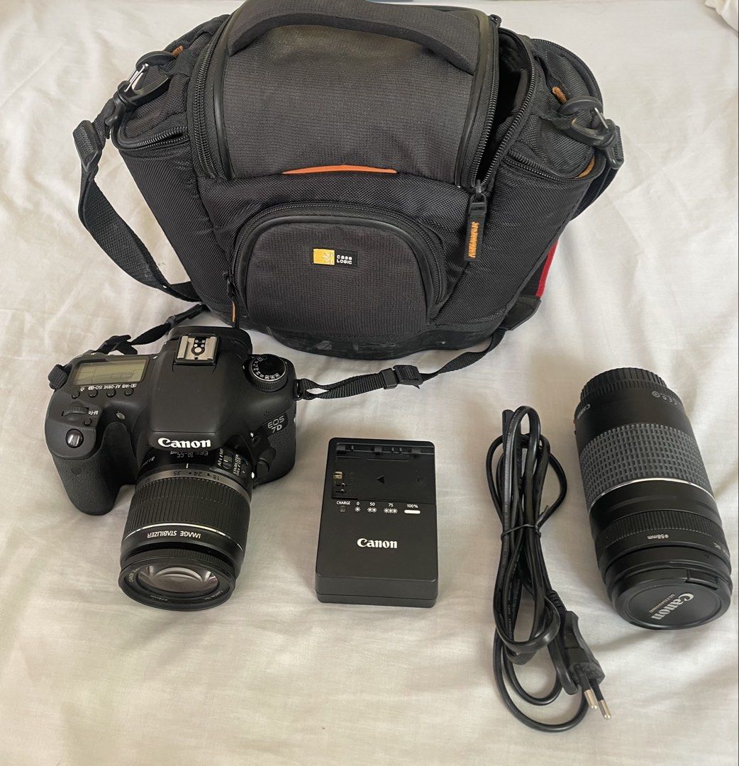 Canon EOS 7D DSLR Camera Bundle with Lenses (Category: Cameras) located in Muntinlupa City. Submitted by bestoption4u (Listing ID 1470966043, Image 1). Description: - Canon EOS 7D camera body - 18-55mm standard lens Inclusions : - Extra EF 75-300mm telephoto lens - Original box included - Battery charger - power cord - camera strap - SanDisk CompactFlash 16gb SD card - Padded Case Logic shoulder bag Ideal complete starter kit for photography proj