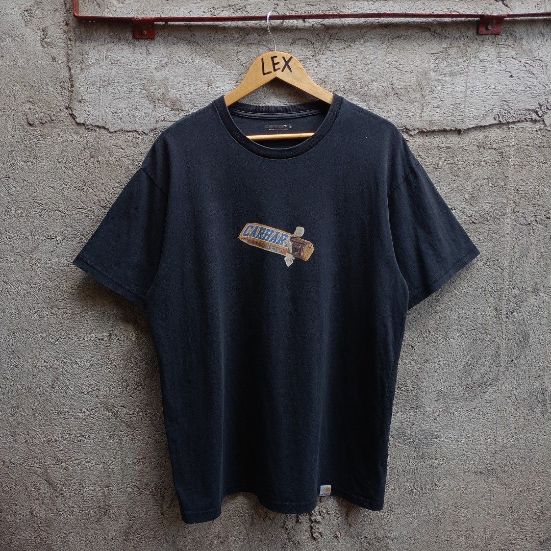 CARHARTT CHOCOLATE BAR BLACK TEE (Category: Tshirts & Polo Shirts ) located in Koronadal. Submitted by thriflex.29 (Listing ID 1470947104, Image 1). Description: CARHARTT CHOCOLATE BAR TEES Size: Large Measurements: Width 22.5 Length 29 Condition: 9/10 - Excellent Colorate: 9/10 Issue: Minor Hairlines print Mine: 499.