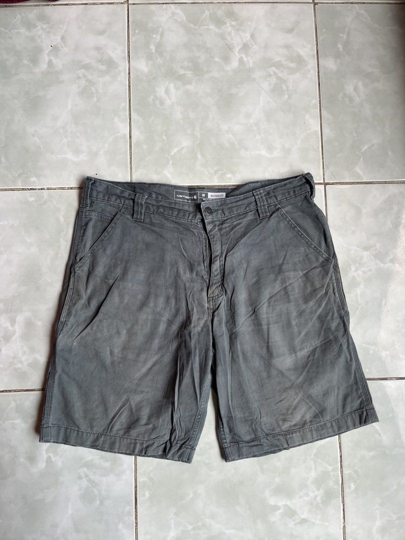 Carhartt Rugged Flex Relaxed Fit Canvas Work Short Size 36 (Category: Shorts) located in Aloran. Submitted by alrodferna18731 (Listing ID 1471058524, Image 2). Description: - Brand/Item: Carhartt Canvas Work Shorts - Color: Dark Grey - Size: 36 (Relaxed Fit) - Material: Cotton and elastane blend with Rugged Flex fabric for easy movement - Features: Multiple utility pockets, side tool pocket, and iconic Carhartt logo patch on the back pocket - Ori