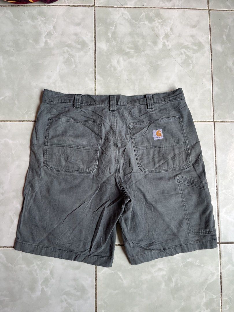 Carhartt Rugged Flex Relaxed Fit Canvas Work Short Size 36 (Category: Shorts) located in Aloran. Submitted by alrodferna18731 (Listing ID 1471058524, Image 1). Description: - Brand/Item: Carhartt Canvas Work Shorts - Color: Dark Grey - Size: 36 (Relaxed Fit) - Material: Cotton and elastane blend with Rugged Flex fabric for easy movement - Features: Multiple utility pockets, side tool pocket, and iconic Carhartt logo patch on the back pocket - Ori