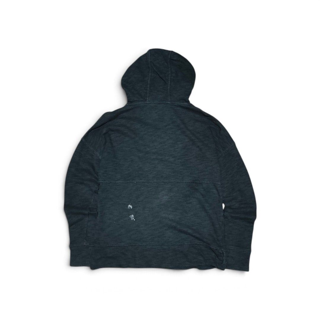 Carhartt Pullover Hoodie with Front Pocket (Category: Hoodies) located in Taguig. Submitted by lloydyy_thrift (Listing ID 1471007581, Image 2). Description: - Brand: Carhartt - Color: Dark grey with a vintage faded wash - Style: Lightweight pullover hoodie with drawstring hood and long sleeves - Features: Front pouch pocket with brand logo tag - Condition: Good overall, but has noticeable paint stains near the bottom hem on the back -width 21 len