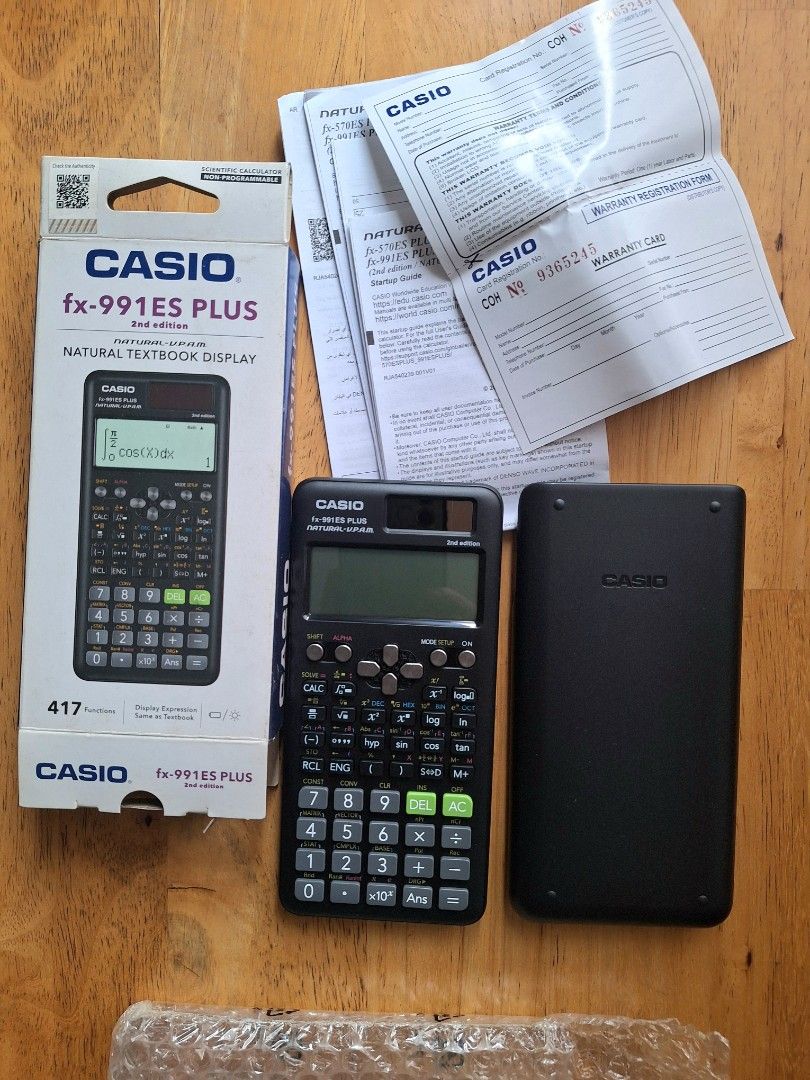 Casio fx-991ES Plus 2nd Edition Scientific Calculator (Category: Office & Business Technology) located in Makati City. Submitted by celybee (Listing ID 1470932491, Image 3). Description: - Brand new, never used Casio fx-991ES Plus 2nd Edition scientific calculator - Purchased from National Book Store (price tag still attached) - Features Natural Textbook Display with 417 functions - Complete with original box, hard slide-on case, warranty card, a