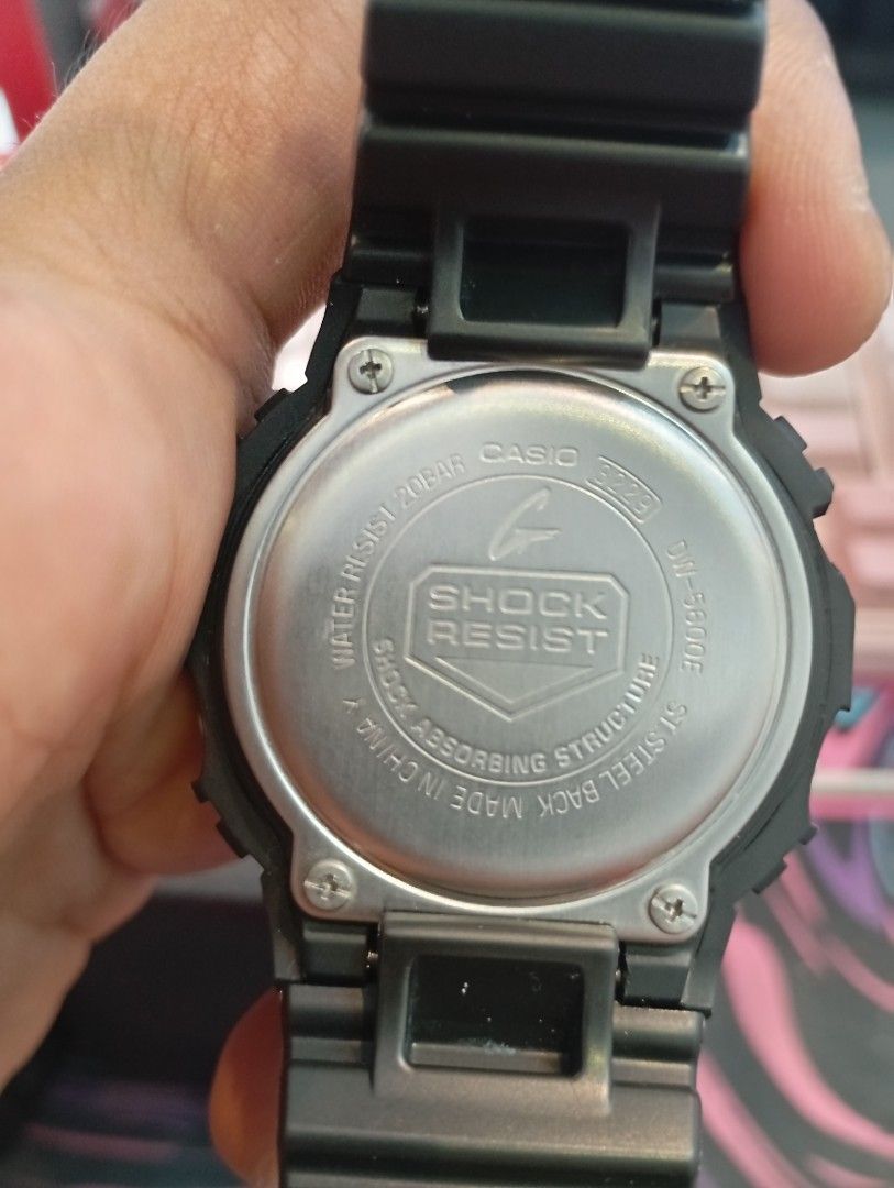 Casio G-Shock DW-5600E Digital Watch (Category: Men's Watches) located in Manila. Submitted by jcaseanti (Listing ID 1470941931, Image 3). Description: - Model: Casio G-Shock DW-5600E (Module 3229) - Condition: Clean, fully tested, and working properly - Design: Classic square digital watch with black resin strap and bezel - Key Features: Shock-absorbing structure, 200m water resistance, and electro-luminescent backlight - Inclusions: Original G-