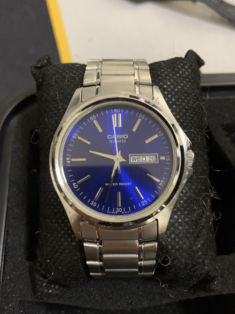 Casio Quartz Blue Dial Steel Watch (Category: Men's Watches) located in Manila. Submitted by relokado (Listing ID 1470937857, Image 1). Description: - Brand: Casio - Movement: Reliable Japan quartz analog movement - Dial: Striking blue sunburst dial with clean crystal - Features: Convenient day and date window at the 3 o'clock position - Case & Bracelet: Silver-tone stainless steel with minimal wear on links - Closure: Standard secure clasp.