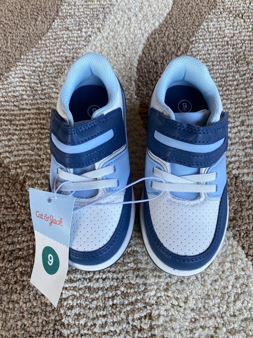 Cat & Jack Toddler Blue Sneakers Size 9 (Category: Babies & Kids Fashion) located in Batangas. Submitted by lux_kimmy (Listing ID 1471043111, Image 1). Description: - Brand: Cat & Jack - Size: 9 Toddlers for 2-4Y - Color: Blue and white - Closure: Easy hook-and-loop strap with faux laces - Soles: Non-marking for extra grip - Condition: Brand new with original brand tag attached.