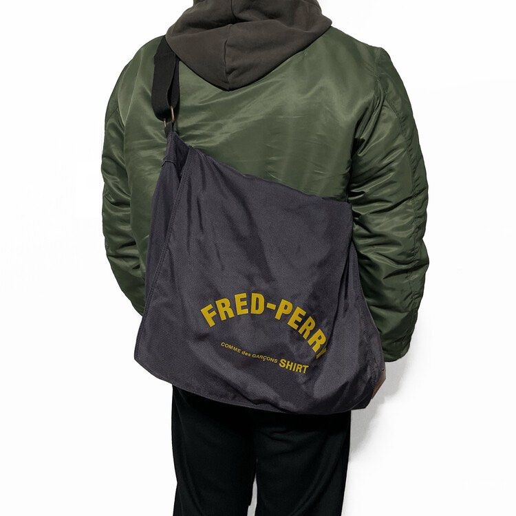 CDG x FREDPERRY Messengerbag (Category: Luxury Bags & Wallets) located in Bauang. Submitted by thriftypockets92 (Listing ID 1471017258, Image 2). Description: .