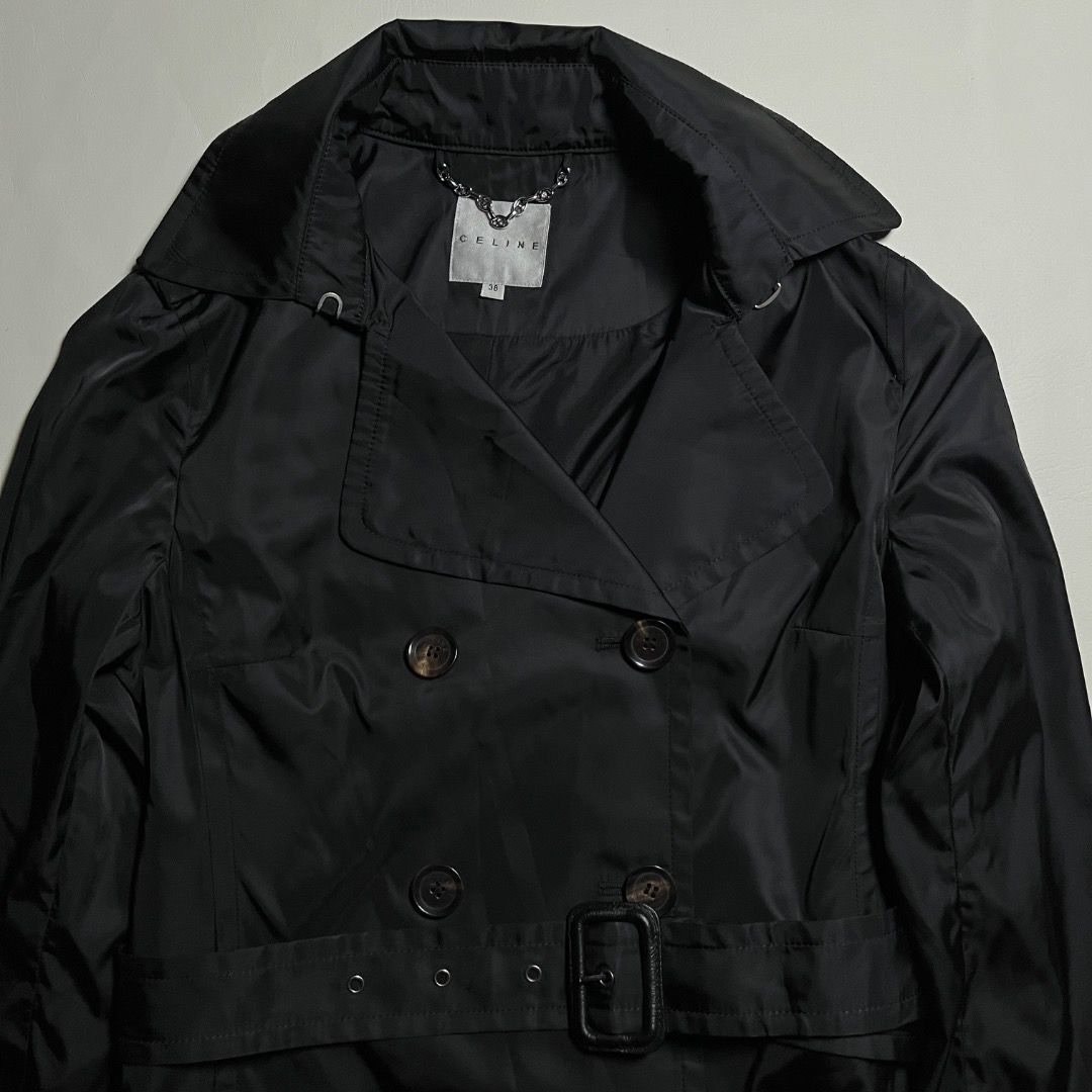 Celine Paris Nylon Double-breasted Trench Coat (Category: Luxury Apparel) located in Caloocan City. Submitted by achilles_grails (Listing ID 1471049740, Image 1). Description: - Brand: Celine - Size: 38 (Made in France) - Material: Polyurethane, cotton, polyester, and polyamide blend - Details: Branded buttons, matching belt buckle, and signature chain detail inside the collar - Care: Dry clean only - Condition: Classic staple piece, perfect for 
