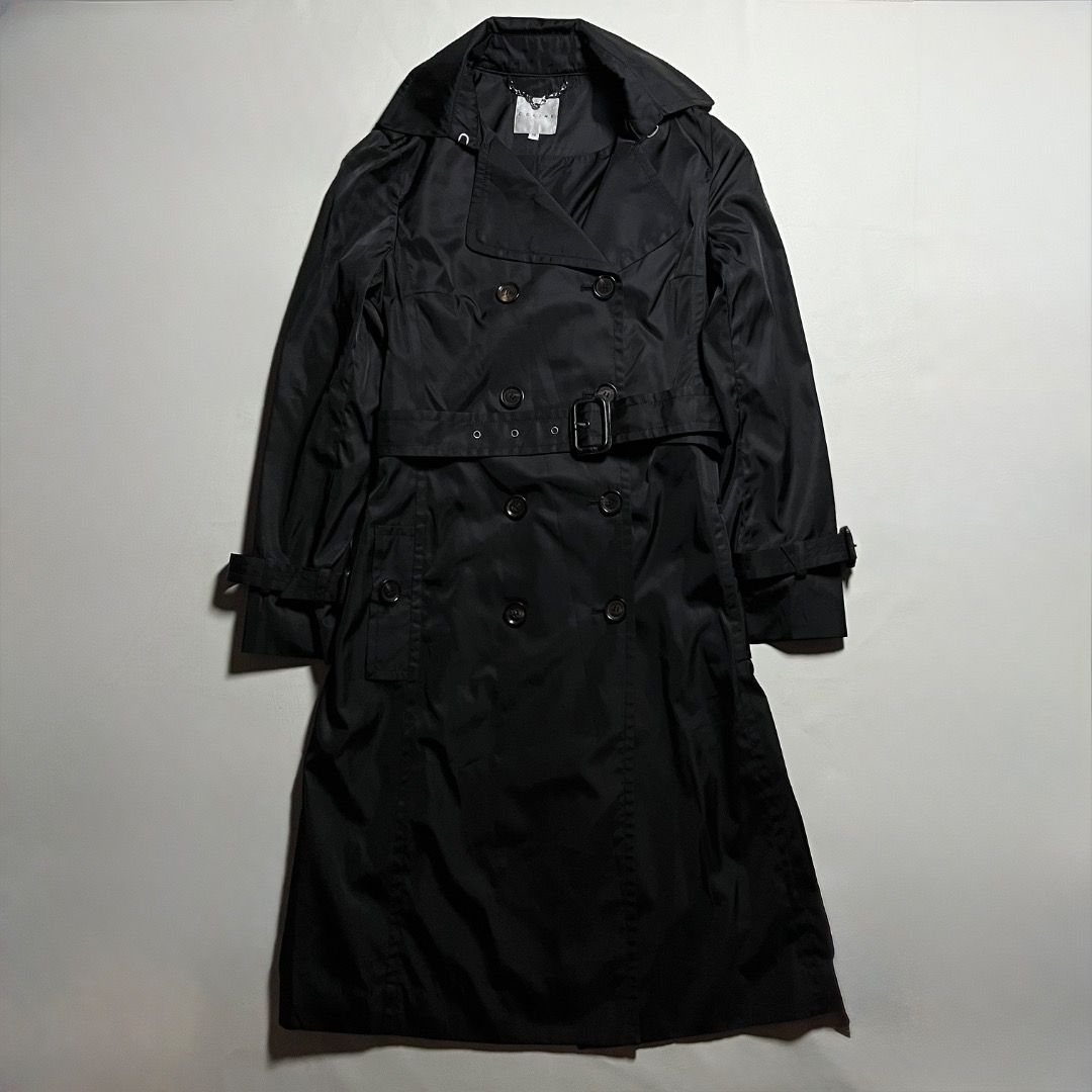 Celine Paris Nylon Double-breasted Trench Coat (Category: Luxury Apparel) located in Caloocan City. Submitted by achilles_grails (Listing ID 1471049740, Image 2). Description: - Brand: Celine - Size: 38 (Made in France) - Material: Polyurethane, cotton, polyester, and polyamide blend - Details: Branded buttons, matching belt buckle, and signature chain detail inside the collar - Care: Dry clean only - Condition: Classic staple piece, perfect for 