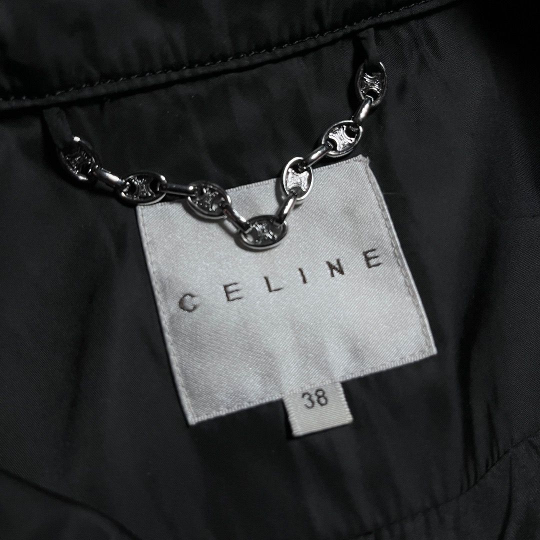 Celine Paris Nylon Double-breasted Trench Coat (Category: Luxury Apparel) located in Caloocan City. Submitted by achilles_grails (Listing ID 1471049740, Image 3). Description: - Brand: Celine - Size: 38 (Made in France) - Material: Polyurethane, cotton, polyester, and polyamide blend - Details: Branded buttons, matching belt buckle, and signature chain detail inside the collar - Care: Dry clean only - Condition: Classic staple piece, perfect for 