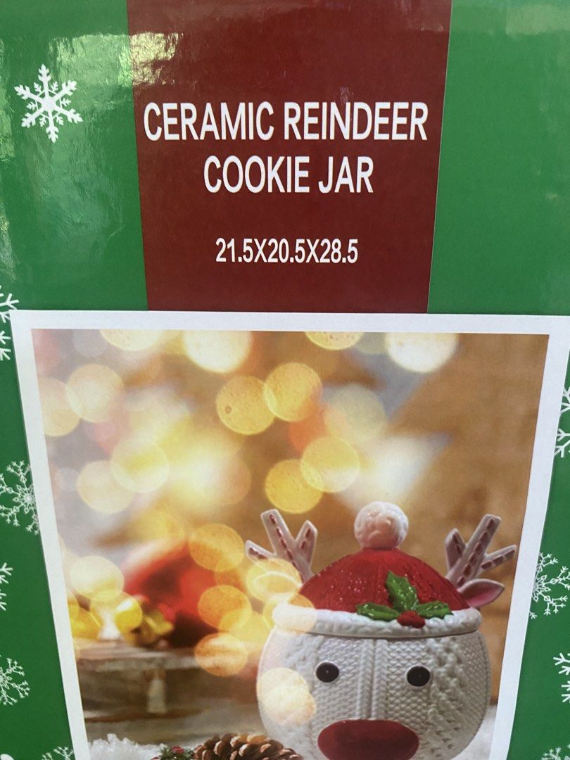 Ceramic Reindeer Cookie Jar Christmas S&R (Category: Food Organization & Storage) located in Santa Rosa. Submitted by hoardqueensdeclutter (Listing ID 1470932885, Image 3). Description: - Brand new item, still in original green snowflake box - Festive reindeer container wearing a Santa hat with cute red nose and antlers - Made of white ceramic with a cozy knit texture pattern - Exclusively made for S&R Membership Shopping - Dimensions: 21.5 x 20.