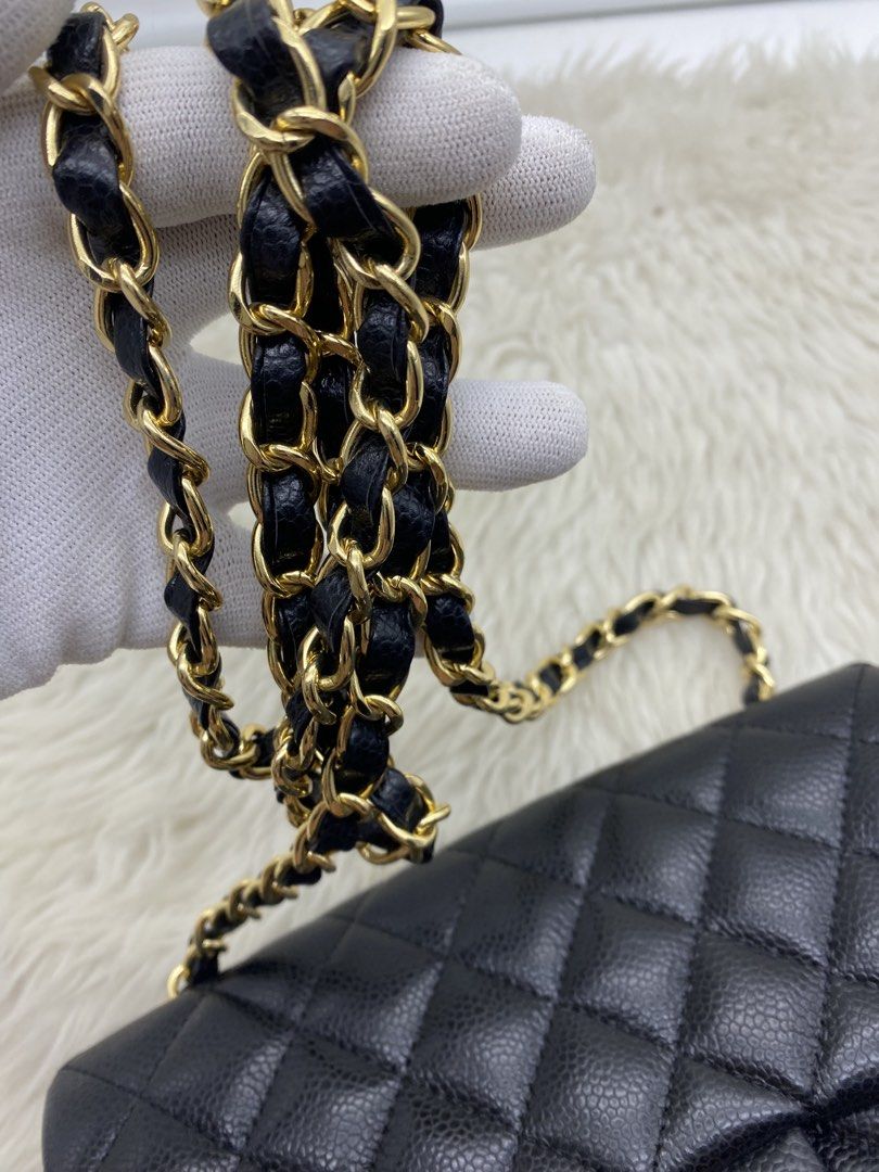 Chanel Black Caviar Leather Classic Flap Bag (Category: Luxury Bags & Wallets) located in Bacolod City. Submitted by chuchaystuffs (Listing ID 1470984151, Image 3). Description: - Brand: Chanel - Material: Black quilted caviar leather - Hardware: Gold-tone with iconic CC turnlock closure - Strap: Intertwined leather and chain shoulder strap - Design: Classic flap with structured shape and clean interior lining - Condition: Great shape, ready for 