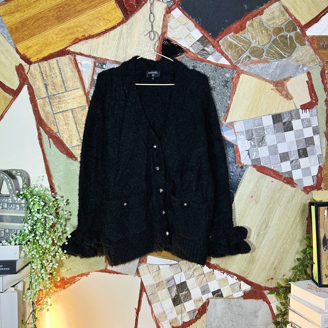 Chanel cardigan (Category: Luxury Apparel) located in Baguio. Submitted by kckc_luxury (Listing ID 1471095427, Image 2). Description: 🌸 TINY PINK SPOTS ARE LENS DAMAGE, NOT CLOTH STAINS ————————— ❗️KINDLY READ BEFORE MAKING AN OFFER❗️ LISTING DETAILS size:Large width x length (inches):25x28 condition: GOOd condition --- MOP: Gcash / BPI MOD: J&T / JRS LOCATION: Baguio City --- NOTE: • Manage your expectations • Photos did not go under any edit b