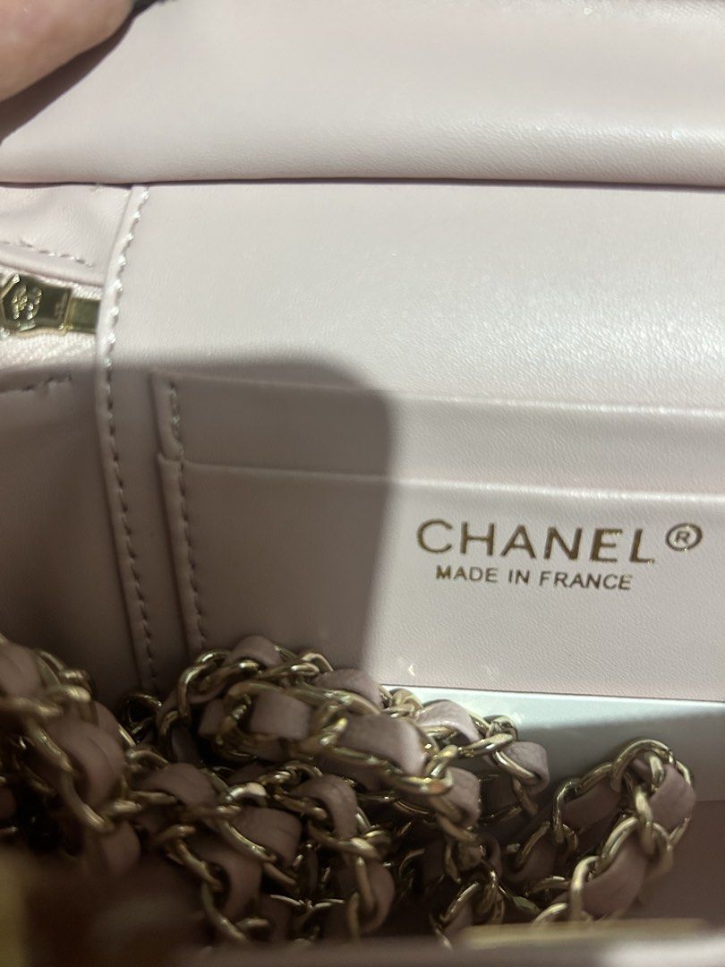 Chanel Pink Caviar Vanity Case with Handle (Category: Luxury Bags & Wallets) located in Cavite. Submitted by zacharyyy__ (Listing ID 1471059847, Image 2). Description: - Chanel vanity case in light pink quilted caviar leather - Features a structured box shape with a top handle and zip-around closure - Iconic silver interlocking CC logo on the front with matching silver hardware - Pink luggage-style interior featuring a cute doll display - Clean s