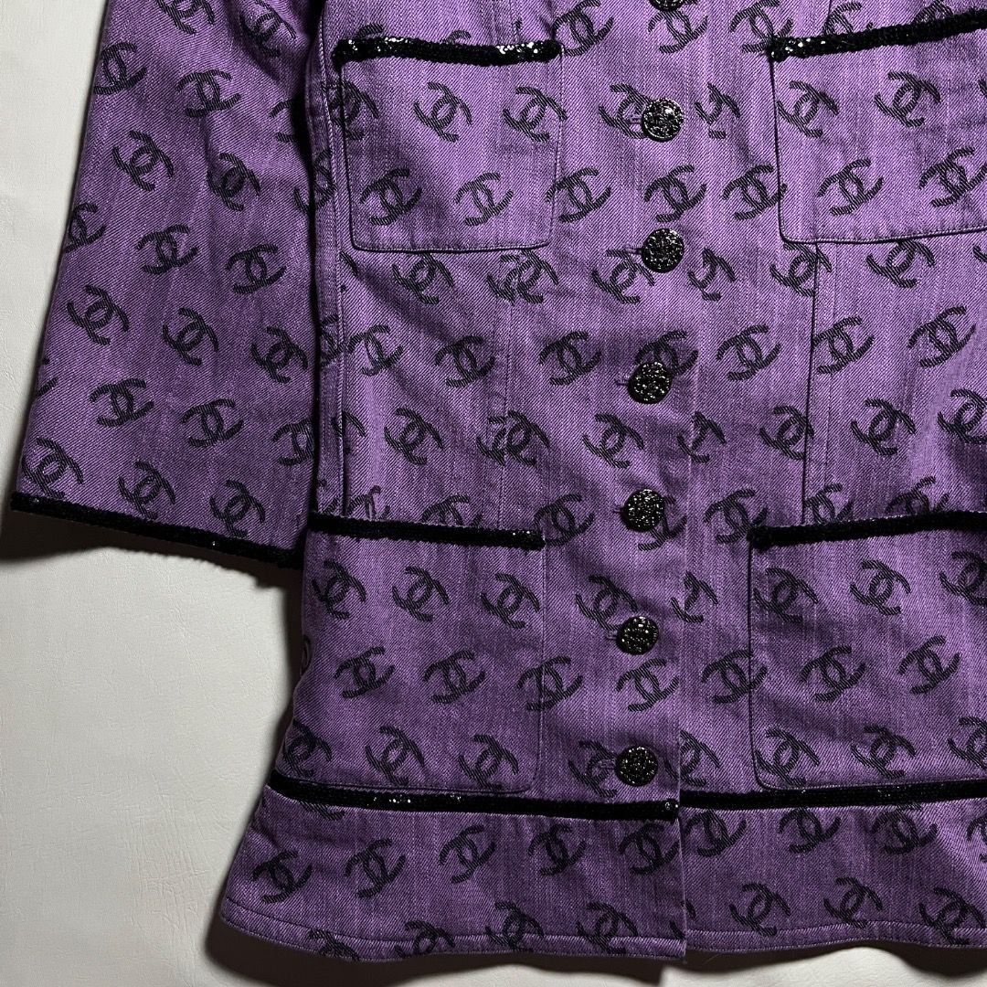 Chanel Purple CC Monogram Denim Jacket Size 38 (Category: Coats, Jackets and Outerwear) located in Caloocan City. Submitted by achilles_grails (Listing ID 1471048436, Image 3). Description: - Authentic Chanel jacket in a striking purple shade covered in iconic black CC logos - Made in Italy with 100% premium cotton and a luxurious silk lining - Size: 38 (EU/FR) - Features a classic button-up front, functional front pockets, and chic textured trim