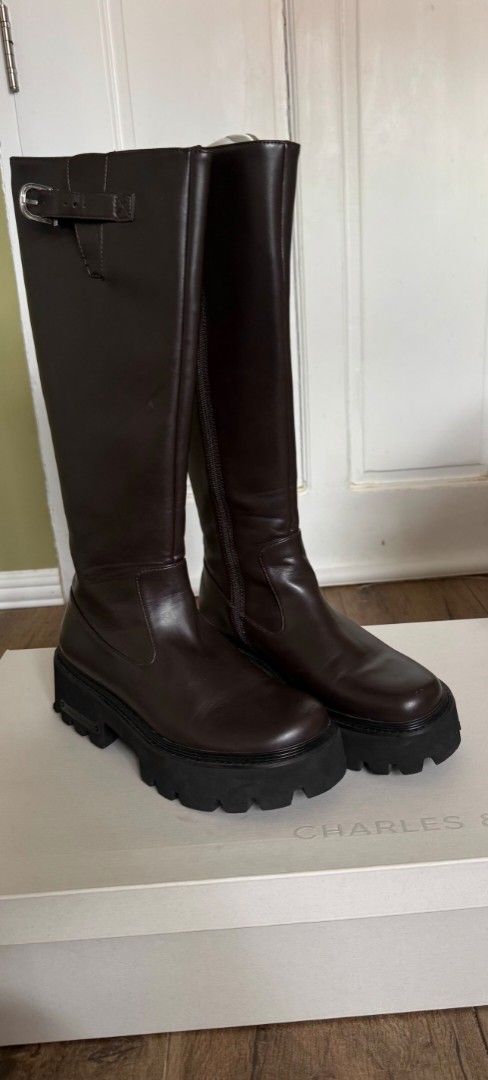 Charles & Keith Dark Brown Knee Boots Size 39 (Category: Boots) located in Manila. Submitted by ajewnice (Listing ID 1470980567, Image 1). Description: - 3900 slightly negotiable for sure buyer - Size: EU 39 - Condition: Worn once, extremely clean soles - Inclusion: Original shoe box included.