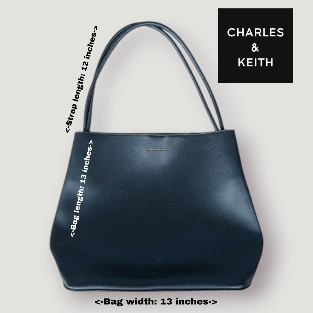 Charles & Keith Leia Black Leather Tote Bag (Category: Tote Bags) located in Bacoor. Submitted by nineties_kid (Listing ID 1471013839, Image 1). Description: •==> Charles & Keith Leia Black Leather Tote Bag Size: Large Bag width/dimension: 13 x 15.5 x 16.5 x 13.5 Bag length: 13 inches Bag space: 4.8 inches Strap length: 12 inches Issues: Scratches as a sign of use. Leather edges breakage. Bottom leather wrinkles. All issues provided in photos. __