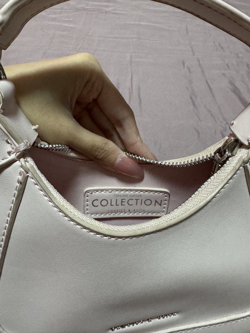 Charles and Keith Mini Hobo Bag Pink (Category: Luxury Bags & Wallets) located in Quezon City. Submitted by meecaisawesome (Listing ID 1471009431, Image 3). Description: Negotiable for sure buyers!.