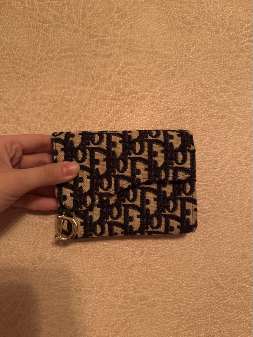 D navy blue wallet (Category: Wallets & Card holders) located in Pasig City. Submitted by decluttering_slay (Listing ID 1471066200, Image 2). Description: .