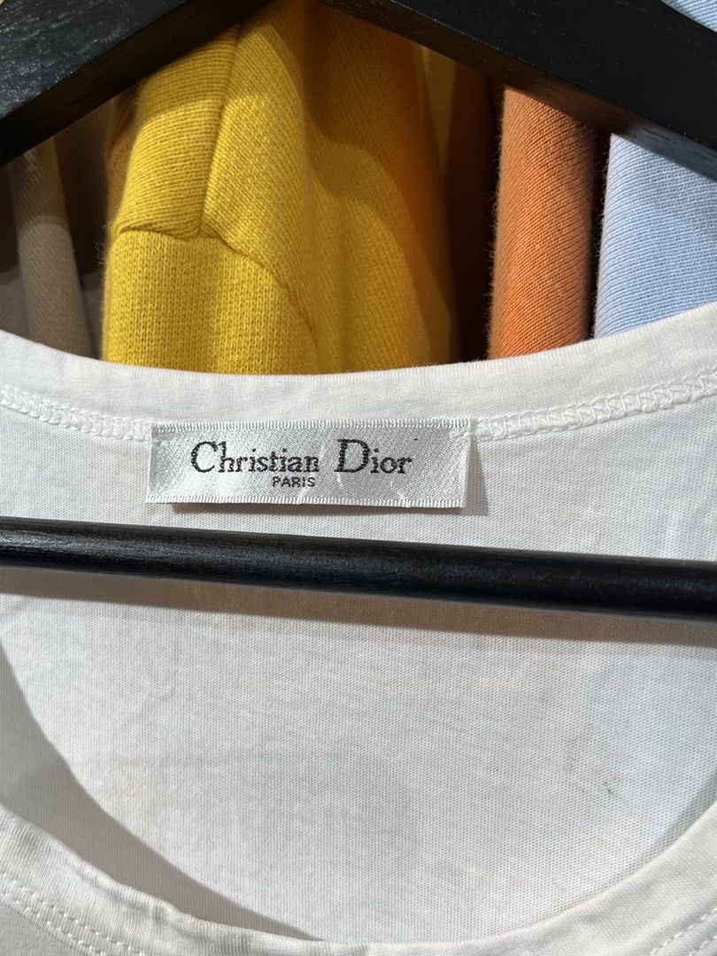Christian Dior White Tank Top (Category: Others Tops) located in Lucban. Submitted by rep.rznt (Listing ID 1470968018, Image 3). Description: Dimes: 16 width, 22 length .