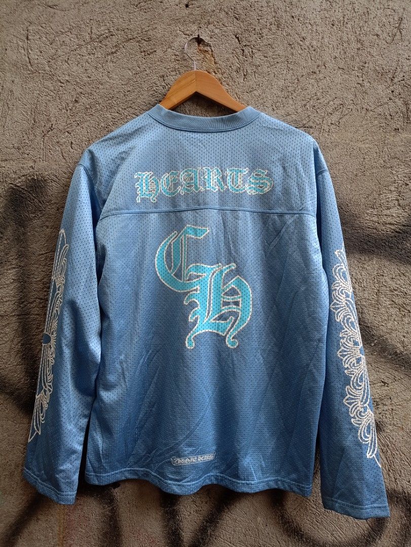 Chrome Hearts Blue V-Neck Mesh Jersey (Category: Activewear) located in Manila. Submitted by naixhrift (Listing ID 1470969223, Image 1). Description: - Chrome Hearts Jersey - Item: Light blue mesh jersey - Size: Small On tag Pasok Sa Medium to large (Made in USA) Off Or Legit - Sleeves: Detailed scroll graphics printed down both arms - Length 27 - Width 24 1800 plus ship jnt courier payment on gcash manila area .