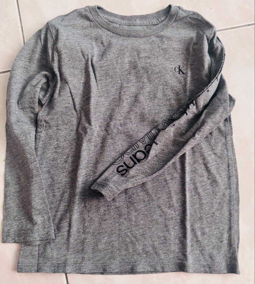 Ck long sleeve (Category: Babies & Kids Fashion) located in Tarlac. Submitted by kai.0621 (Listing ID 1470993691, Image 1). Description: Twice use available black & gray 4T.