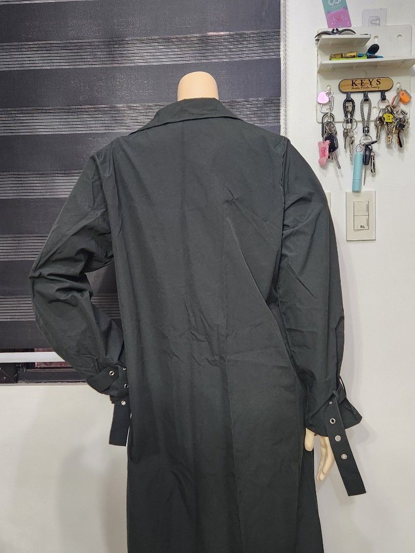 B-2 Classic Black Long Trench Coat (Category: Coats, Jackets and Outerwear) located in Tanza. Submitted by wearitagainph (Listing ID 1471012177, Image 3). Description: Sleek, chic, and versatile! Features a button-down front, classic notch lapel collar, and stylish gathered cuff details. * Bust: 43" * Length: 48" * Color: Black * Condition: Excellent DM to order or inquire!.
