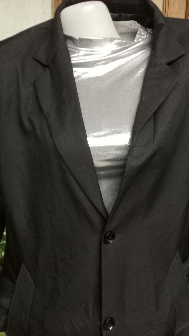 Classic Black Trench Coat Long Jacket Outerwear (Category: Coats, Jackets and Outerwear) located in Cavite. Submitted by garinmaric11231 (Listing ID 1470959460, Image 3). Description: - Color: Classic Black - Style: Long trench coat jacket with structured shoulders - Features: Lapel collar, front button closure, and functional side pockets - Fabric: Clean dark fabric, ideal for cooler weather - Versatility: Easy to layer over sweaters or shirts; 