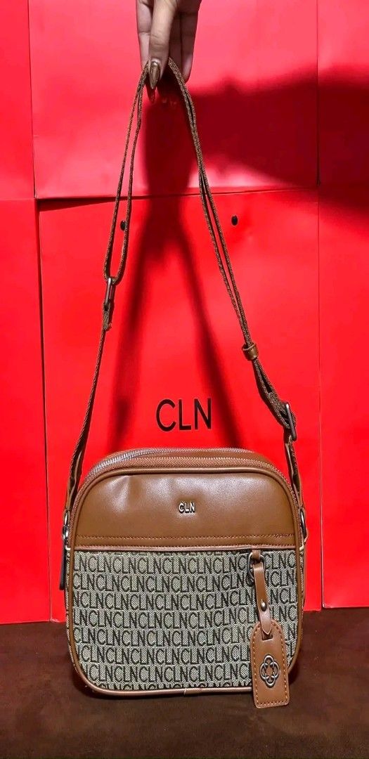 CLN Brown and Monogram Crossbody Bag (Category: Cross-body Bags) located in Manila. Submitted by silvermoon_b802e0 (Listing ID 1470963684, Image 2). Description: - Brand: CLN - Design: Brown and cream monogram print with leather-like top panel - Hardware: Silver CLN logo and matching hanging tag charm - Compartment: Zippered main compartment with front pocket area - Strap: Adjustable long strap - Condition/Shape: Clean stitching, structured shape