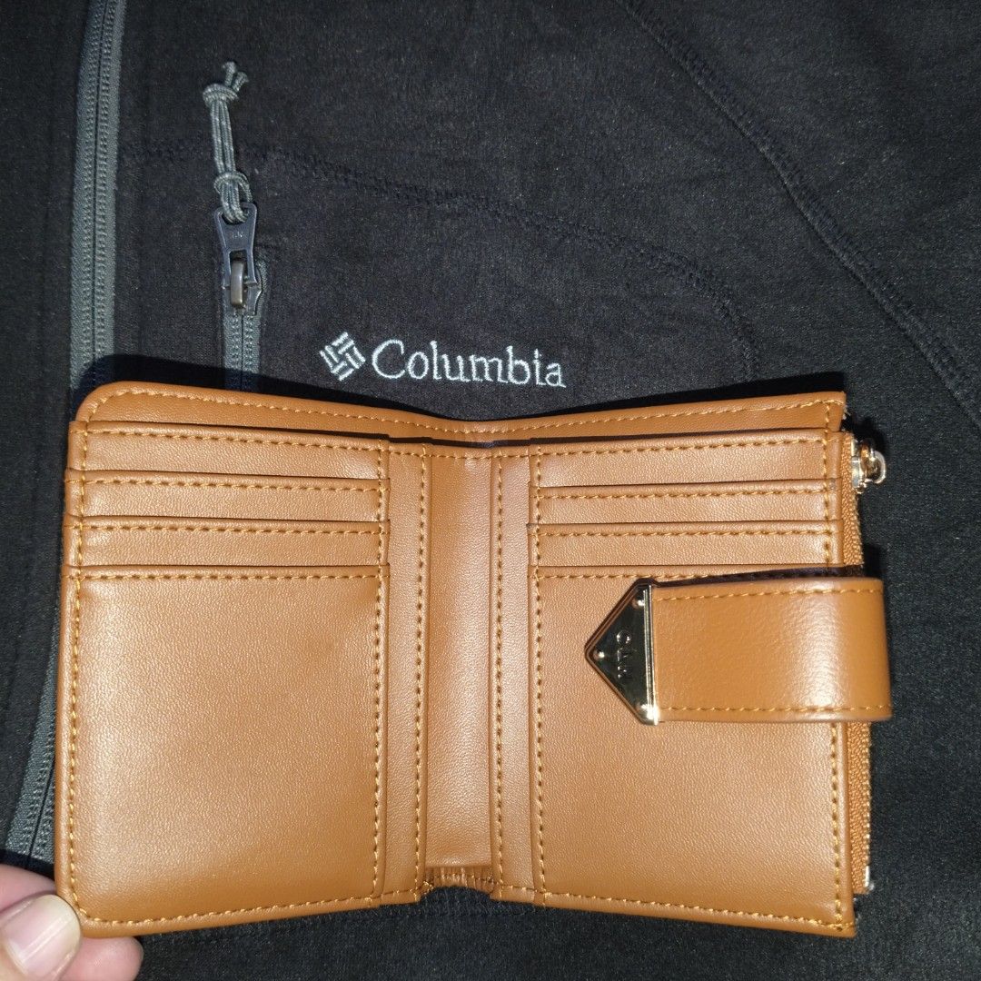 CLN Brown Monogram Bi-fold Wallet with Coin Pocket (Category: Wallets & Card holders) located in Manila. Submitted by usedtobeyours26 (Listing ID 1471074285, Image 2). Description: - Brand/Style: CLN bi-fold wallet - Material: Brown monogram fabric with tan leather trim - Hardware: Gold-tone with CLN logo plaque - Closure: Secure snap button - Storage: Multiple card slots, cash compartment, and a convenient side zipped coin pocket - Interior: Pat