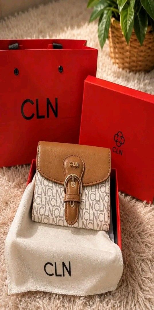CLN Monogram Print Wallet with Buckle (Category: Wallets & Card holders) located in Manila. Submitted by silvermoon_b802e0 (Listing ID 1470965964, Image 3). Description: - Brand: CLN - Color: Tan brown with gold hardware - Design: Monogram pattern with decorative buckle flap - Condition: Brand new, unused, and kept in packaging - Inclusions: Original dust bag, branded red presentation box, and matching paper gift bag.