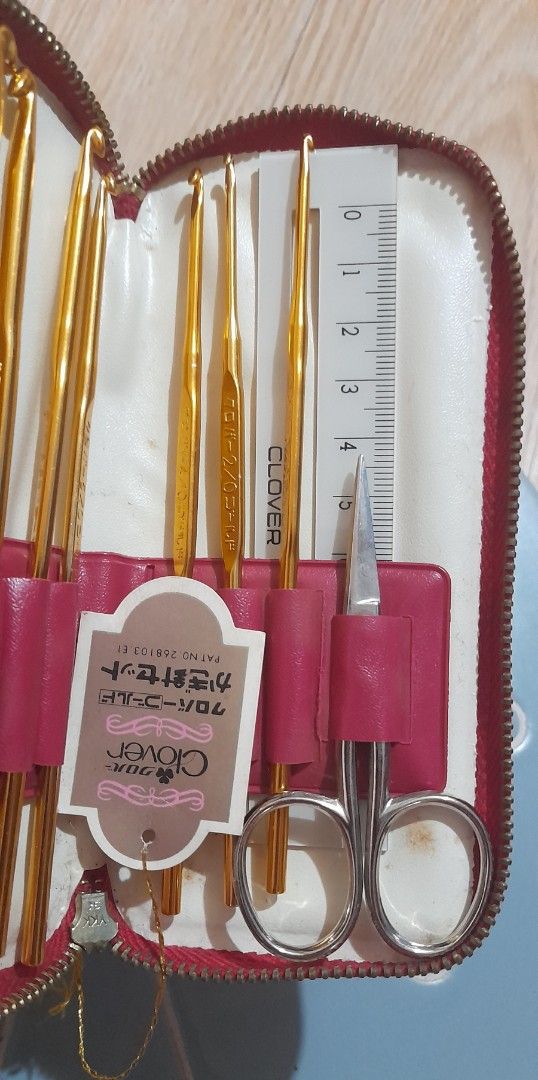 Clover Gold Crochet Hook Set in Red Case (Category: Craft Supplies & Tools) located in Bocaue. Submitted by marajapansurplus (Listing ID 1470977701, Image 3). Description: - Authentic gold-toned Clover crochet hook complete set - Includes multiple hook sizes for all your project needs - Comes with a pair of small scissors and a measuring gauge ruler - Neatly organized in individual slots inside a compact red zippered storage case - Features Japan