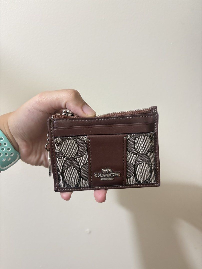 coach keycard case (Category: Luxury Bags & Wallets) located in Baguio. Submitted by thefindsbyelle (Listing ID 1470935241, Image 1). Description: ♡ Ukay-sourced from Baguio ♡ Self-authenticated ♡ Used once only ♡ In excellent, like-new condition ♡ No major flaws, well-kept ✨ Decluttering my collection! 💗 Perfect for everyday use or if you love cute, classy Coach pieces. DM for inquiries or more photos! 🫶🏻 Serious buyers only, please. 🎀.