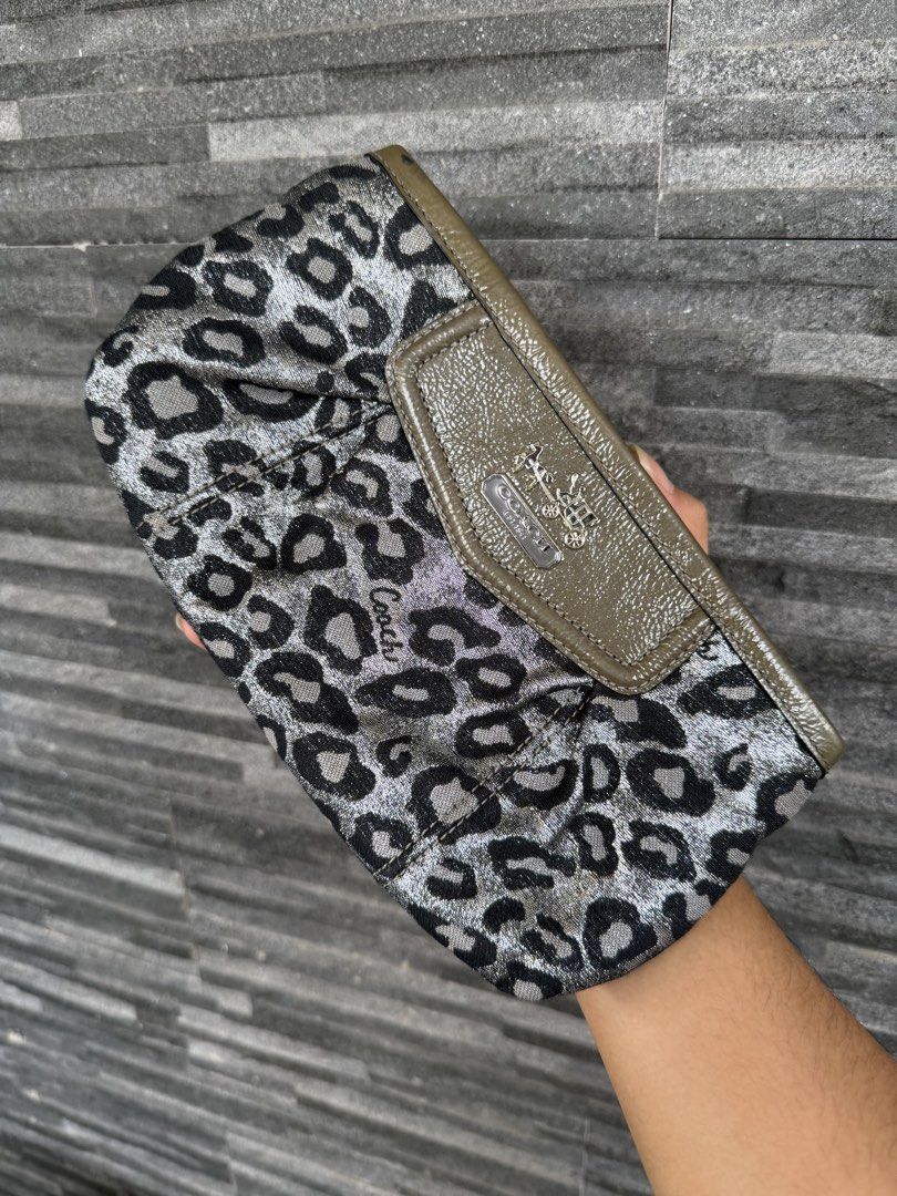 coach leopard pouch (Category: Wallets & Card holders) located in Balanga. Submitted by elle.curated (Listing ID 1470943492, Image 1). Description: Like new condi.
